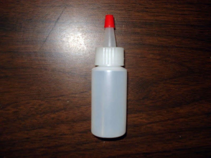 1/2 oz Plastic Bottle with Pour Spout